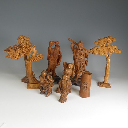 108 - A small quantity of Chinese and Japanese wooden Carvings, to comprise a well-carved figure of a Man ... 