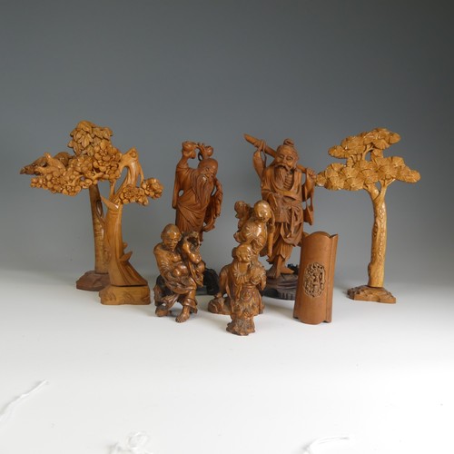 108 - A small quantity of Chinese and Japanese wooden Carvings, to comprise a well-carved figure of a Man ... 