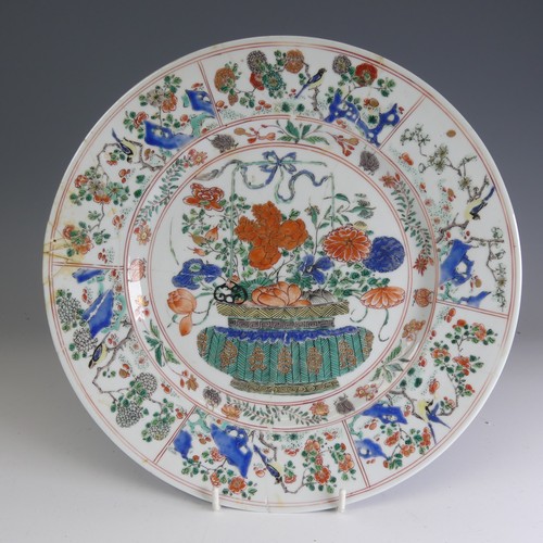 16 - An 18thC Chinese famille verte Plate, of large proportions, decorated with central flower basket mot... 