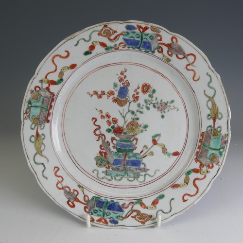 16 - An 18thC Chinese famille verte Plate, of large proportions, decorated with central flower basket mot... 