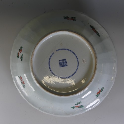 16 - An 18thC Chinese famille verte Plate, of large proportions, decorated with central flower basket mot... 