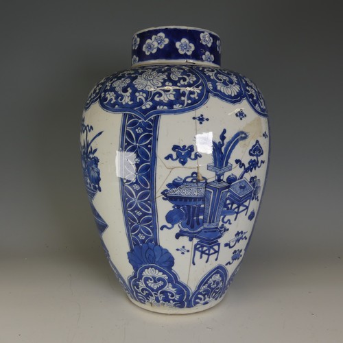 18 - A large 18thC Chinese porcelain blue and white Ginger Jar, the body decorated with four alternating ... 