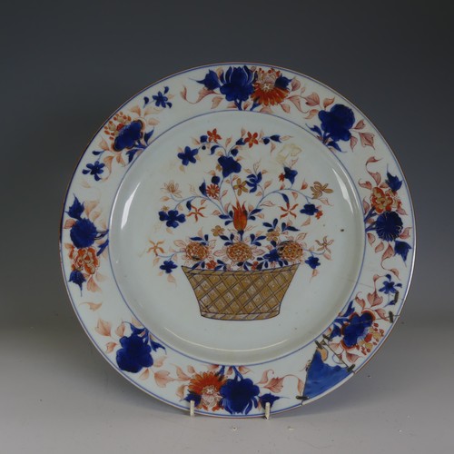 19 - An 18thC Chinese porcelain Imari palette Charger, probably Kangxi/Yongzheng, the well decorated with... 