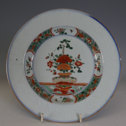 19 - An 18thC Chinese porcelain Imari palette Charger, probably Kangxi/Yongzheng, the well decorated with... 