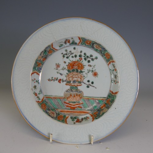 19 - An 18thC Chinese porcelain Imari palette Charger, probably Kangxi/Yongzheng, the well decorated with... 