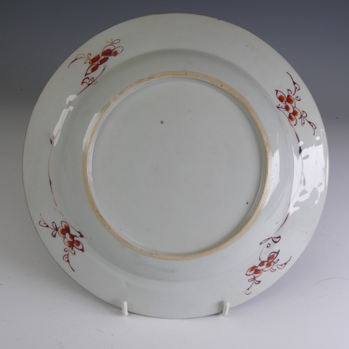 22 - An 18thC Chinese porcelain famille rose Plate, c. 1730, decorated centrally with a famille jaune bow... 