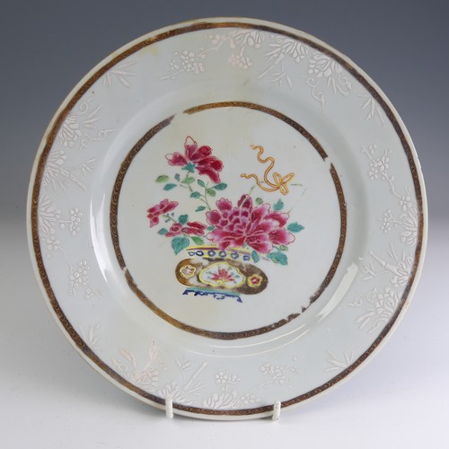 27 - A pair of mid 18thC Chinese Cafe-au-lait famille rose Plates, each decorated with overpainted brown-... 