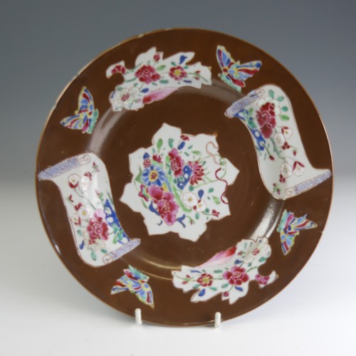 27 - A pair of mid 18thC Chinese Cafe-au-lait famille rose Plates, each decorated with overpainted brown-... 