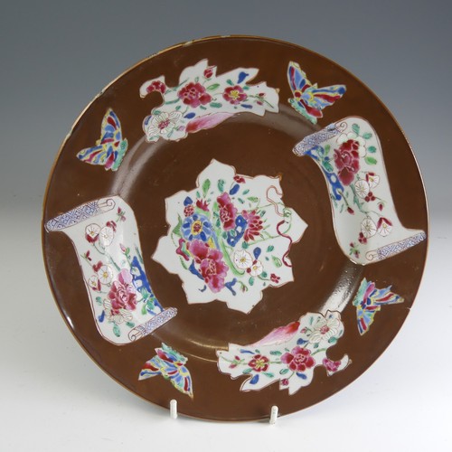 27 - A pair of mid 18thC Chinese Cafe-au-lait famille rose Plates, each decorated with overpainted brown-... 