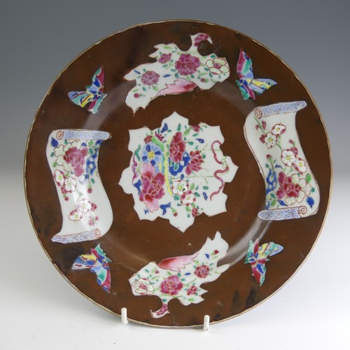 27 - A pair of mid 18thC Chinese Cafe-au-lait famille rose Plates, each decorated with overpainted brown-... 