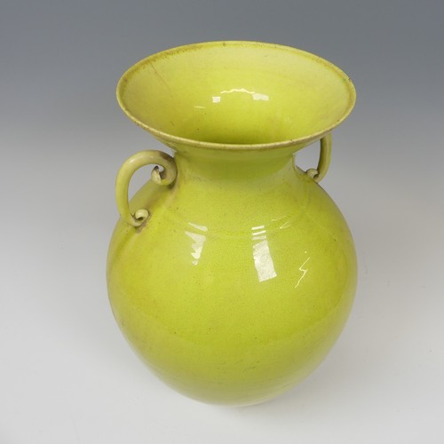 40 - An unusual 19thC Chinese monochrome twin-handled Vase, of lime green colour, baluster form, some fau... 