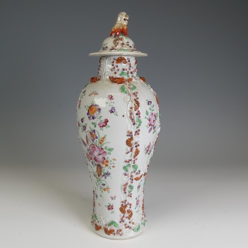 64 - A 19thC Chinese export porcelain slender baluster Vase, and cover, decorated in floral motifs with r... 