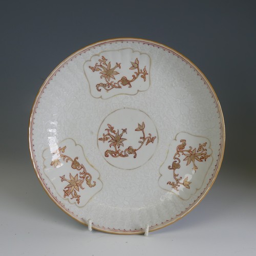 66 - An unusual 19thC Chinese export porcelain Plate, the plain ground with gilded foliate representation... 