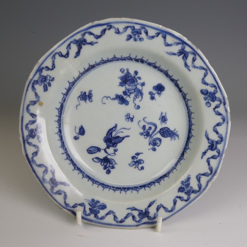 67 - An 18thC Chinese porcelain blue and white Saucer, finely decorated in foliage, D 13.8cm, together wi... 