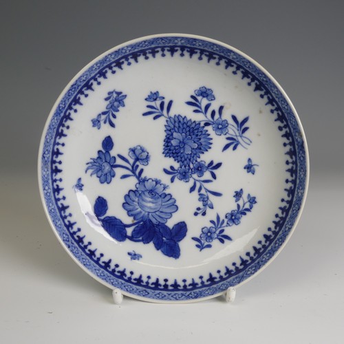 67 - An 18thC Chinese porcelain blue and white Saucer, finely decorated in foliage, D 13.8cm, together wi... 