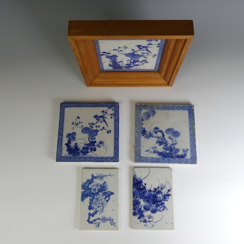 77 - A matched set of three antique Chinese porcelain blue and white Tiles, each depicting exotic birds a... 