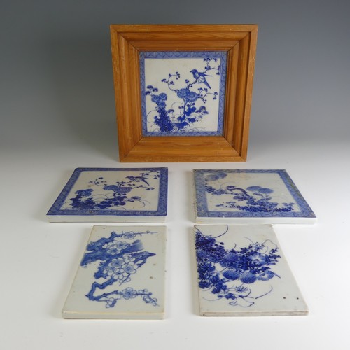 77 - A matched set of three antique Chinese porcelain blue and white Tiles, each depicting exotic birds a... 