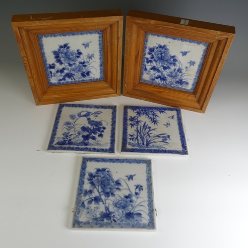 78 - A matched set of 19thC Chinese blue and white porcelain Tiles, each one depicting a bird amongst fol... 