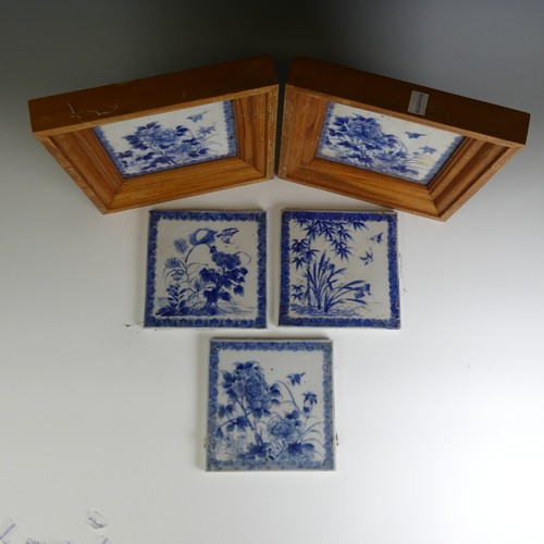 78 - A matched set of 19thC Chinese blue and white porcelain Tiles, each one depicting a bird amongst fol... 