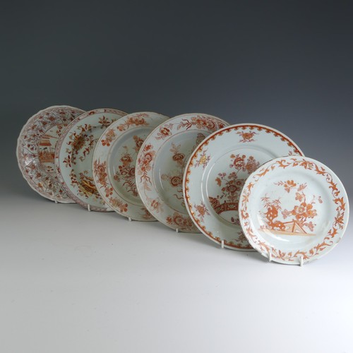 82 - A matched of 18thC Chinese export porcelain Plates, decorated in iron red flora, D 22cm, together wi... 