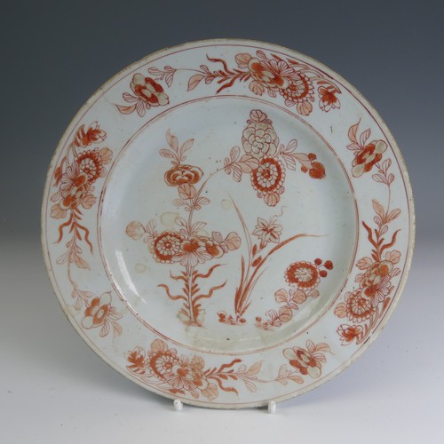 82 - A matched of 18thC Chinese export porcelain Plates, decorated in iron red flora, D 22cm, together wi... 