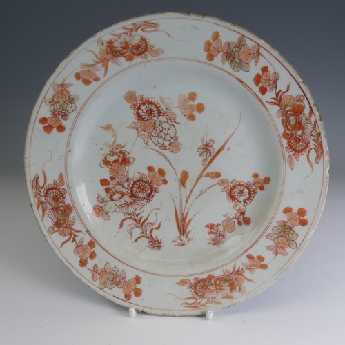 82 - A matched of 18thC Chinese export porcelain Plates, decorated in iron red flora, D 22cm, together wi... 