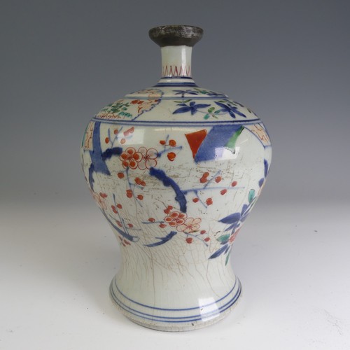 91 - An antique Chinese Wucai porcelain Vase, of baluster form and slender neck, with antique repair, cra... 