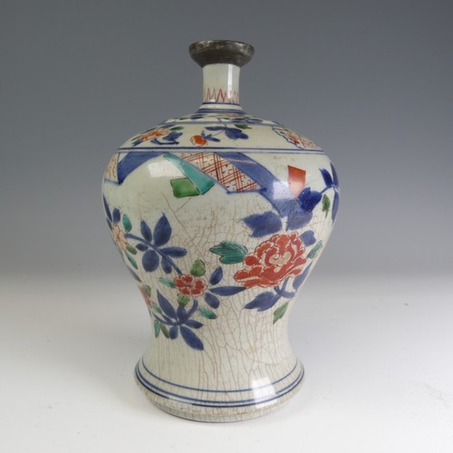 91 - An antique Chinese Wucai porcelain Vase, of baluster form and slender neck, with antique repair, cra... 