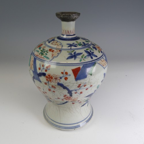 91 - An antique Chinese Wucai porcelain Vase, of baluster form and slender neck, with antique repair, cra... 