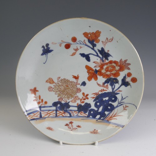 94 - A Republic period famille noir Plate, decorated in colourful floral enamels with six character iron ... 