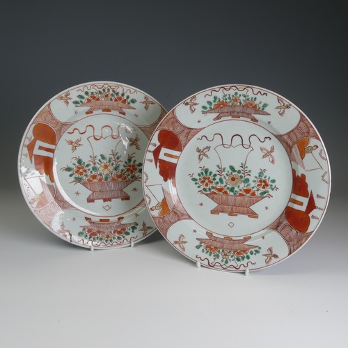 99 - A pair of 18thC Chinese export porcelain Plates, decorated in a Japanese style with iron red and gre... 