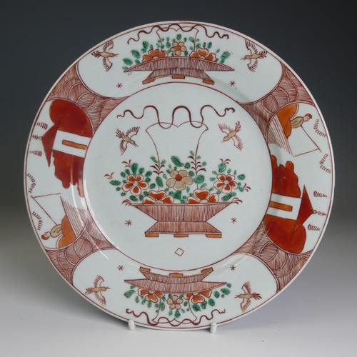 99 - A pair of 18thC Chinese export porcelain Plates, decorated in a Japanese style with iron red and gre... 