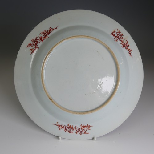 99 - A pair of 18thC Chinese export porcelain Plates, decorated in a Japanese style with iron red and gre... 