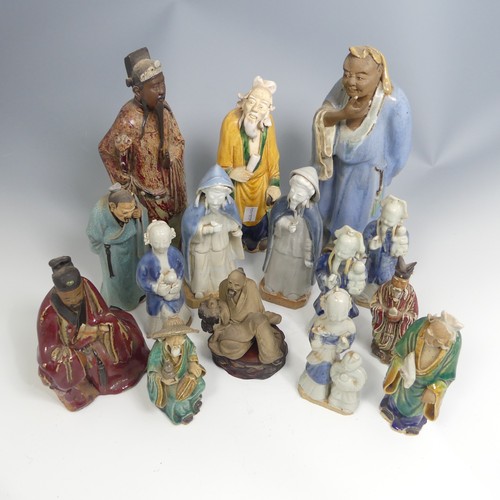 102 - A quantity of decorative Chinese pottery Figures, comprising six early 20thC depictions of Elders, t... 