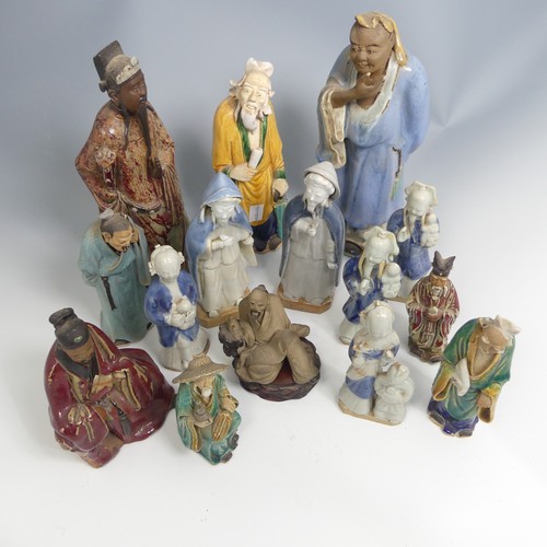 102 - A quantity of decorative Chinese pottery Figures, comprising six early 20thC depictions of Elders, t... 