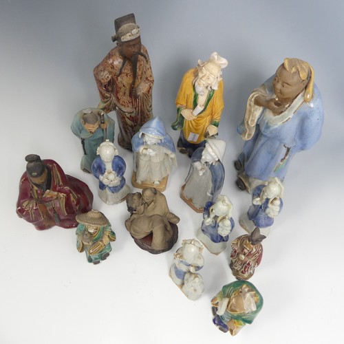 102 - A quantity of decorative Chinese pottery Figures, comprising six early 20thC depictions of Elders, t... 