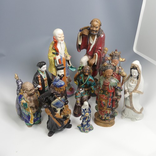 104 - A quantity of 20thC and earlier Chinese pottery and porcelain Figures, comprising a large well decor... 