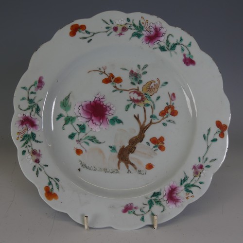 174 - A 19thC Chinese porcelain famille rose Plate, moulded edge, decorated in colourful enamels, D 23cm, ... 