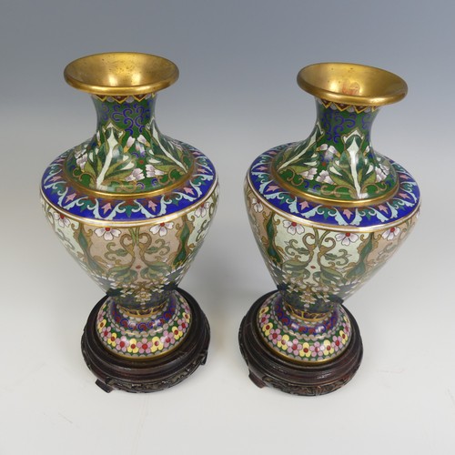 175 - A pair of 20thC Japanese cloisonne Vases, decorated with floral patterns and raised on carved stands... 