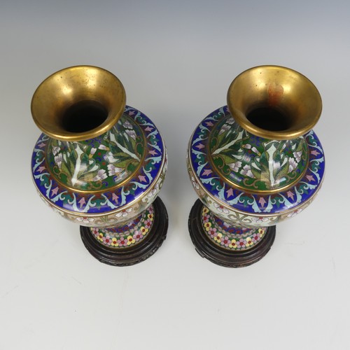 175 - A pair of 20thC Japanese cloisonne Vases, decorated with floral patterns and raised on carved stands... 