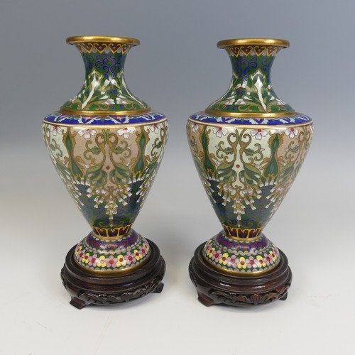 175 - A pair of 20thC Japanese cloisonne Vases, decorated with floral patterns and raised on carved stands... 