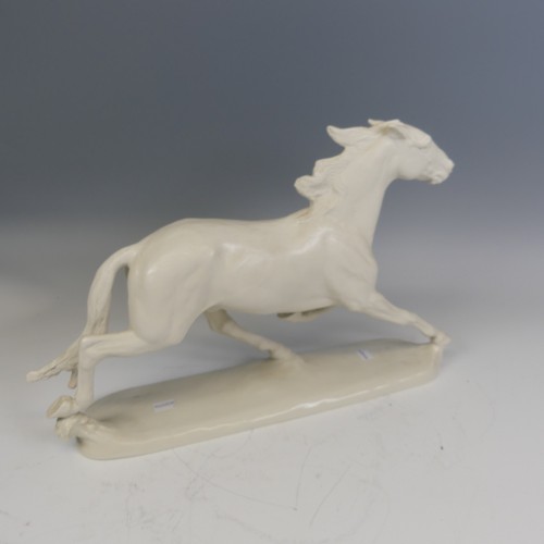 227 - A large Rosenthal white porcelain model of a galloping Horse, stamped 'Rosenthal Germany Kunstabteil... 