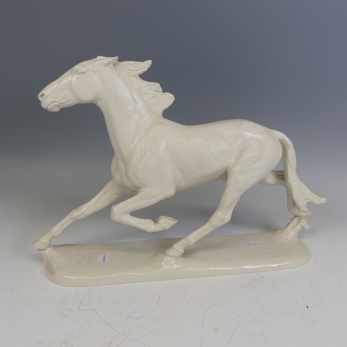 227 - A large Rosenthal white porcelain model of a galloping Horse, stamped 'Rosenthal Germany Kunstabteil... 