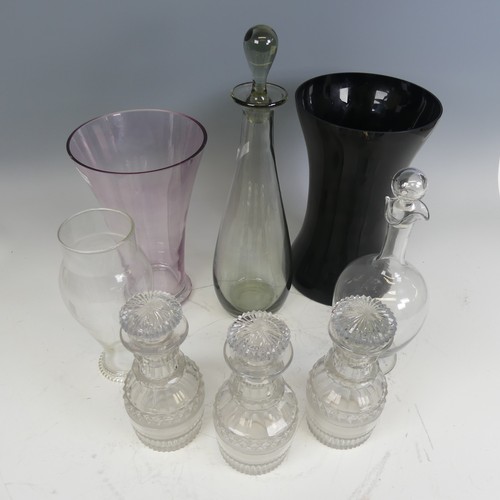 242 - A set of three small cut glass Decanters, H 18 cm, together with a small quantity of other glass inc... 