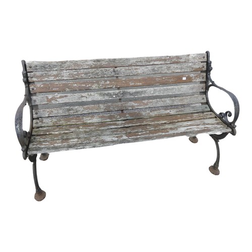 353 - An antique cast iron and teak Garden Seat /Bench, with scrolled supports, W 129.5 cm x H 74 cm x D 4... 