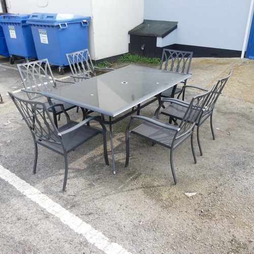 354 - A contemporary glass-topped garden / conservatory Table, together with six matching Chairs, (table) ... 