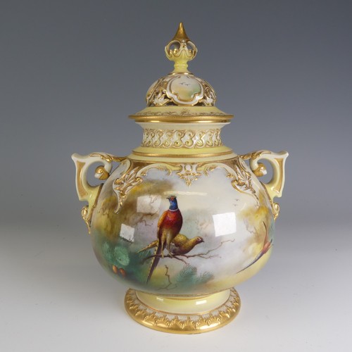 255 - A Hadley ware Royal Worcester porcelain Pot Pourri Urn, decorated with finely handpainted depictions... 