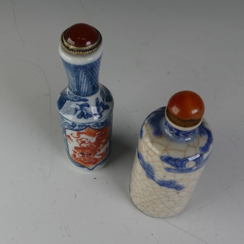 189 - A Chinese porcelain blue and white crackleware Snuff Bottle, of shouldered tapering conical form, un... 