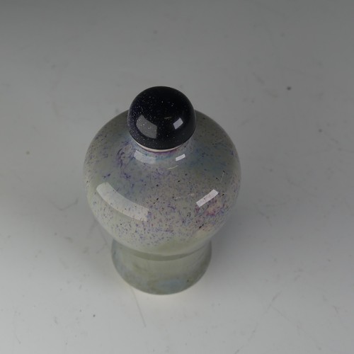 190 - A Chinese flambé porcelain Snuff Bottle, the glaze of blues and greys, raised on foot, H 7cm... 