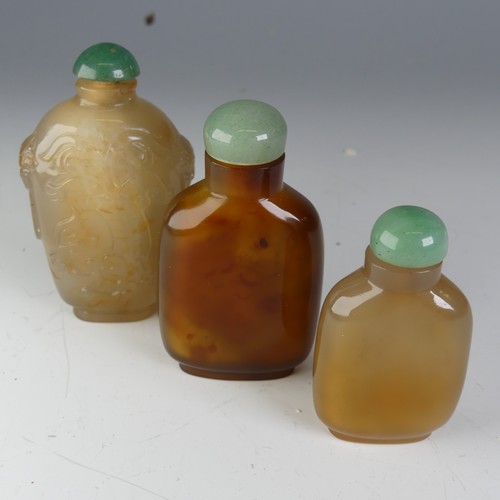 194 - An antique Chinese honey agate Snuff Bottle, well hollowed with jade stopper, H 7.5cm, together with... 